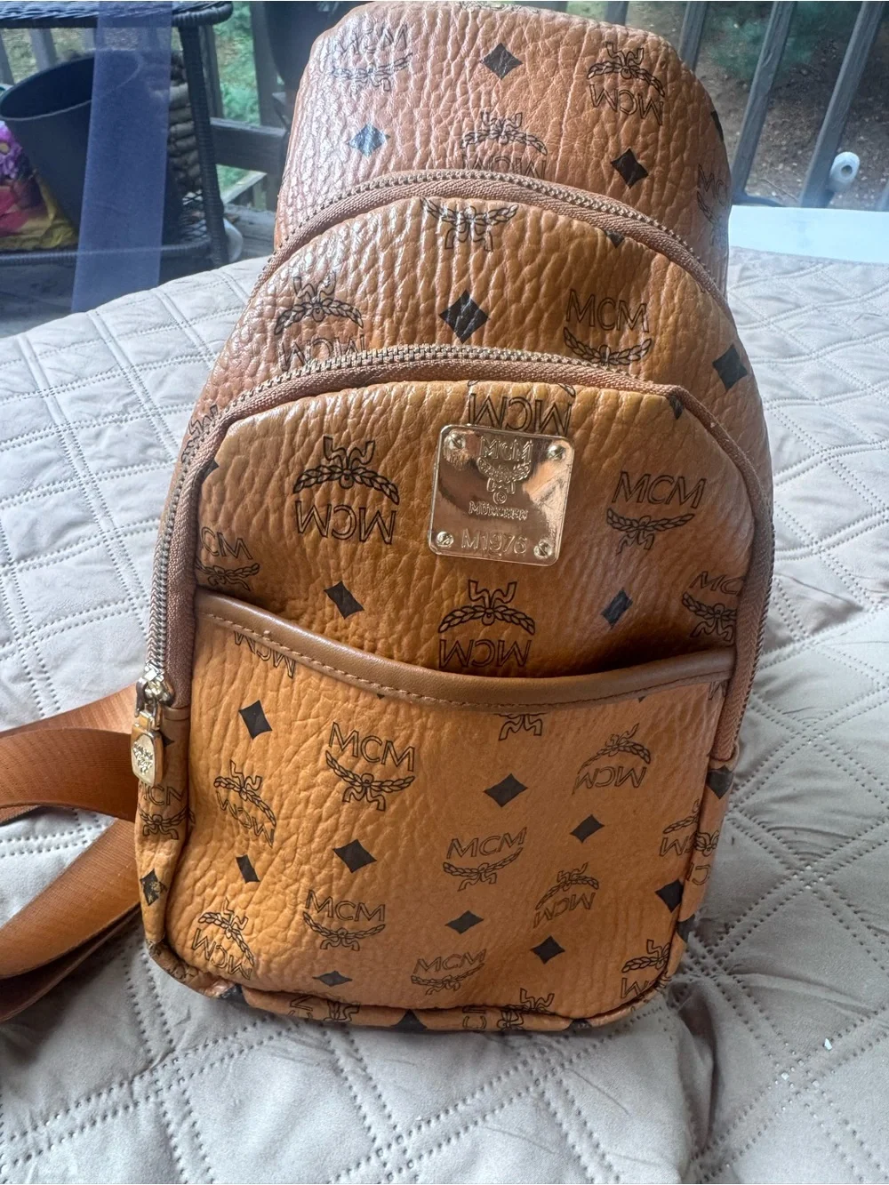 MCM Cognac Brown Logo Leather Sling Backpack with Gold Plaque